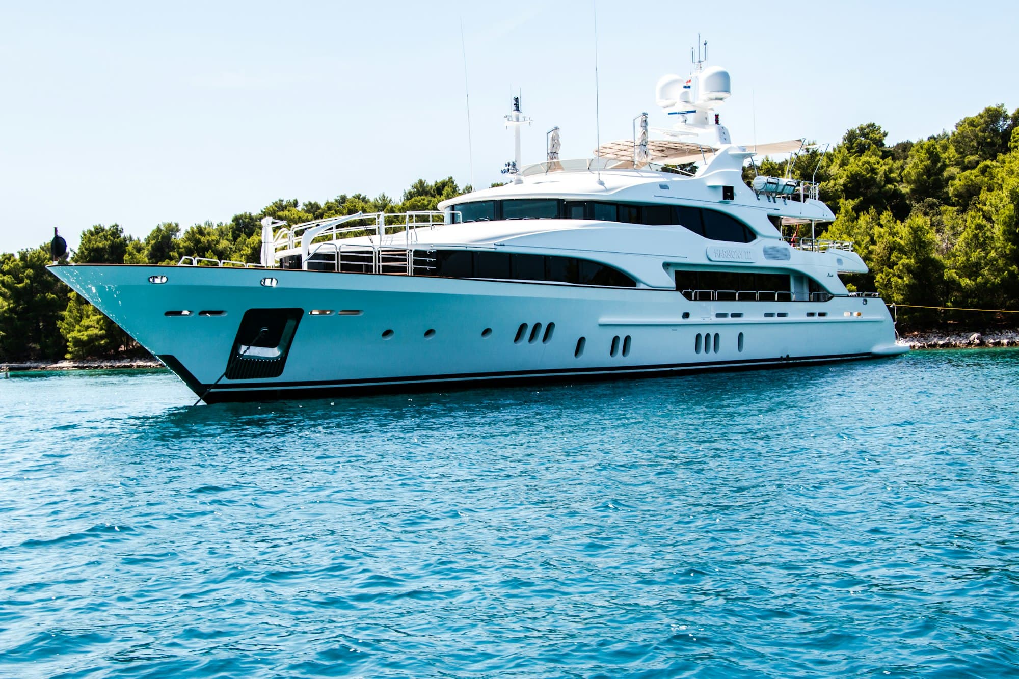 Luxury motor yacht on turquoise water